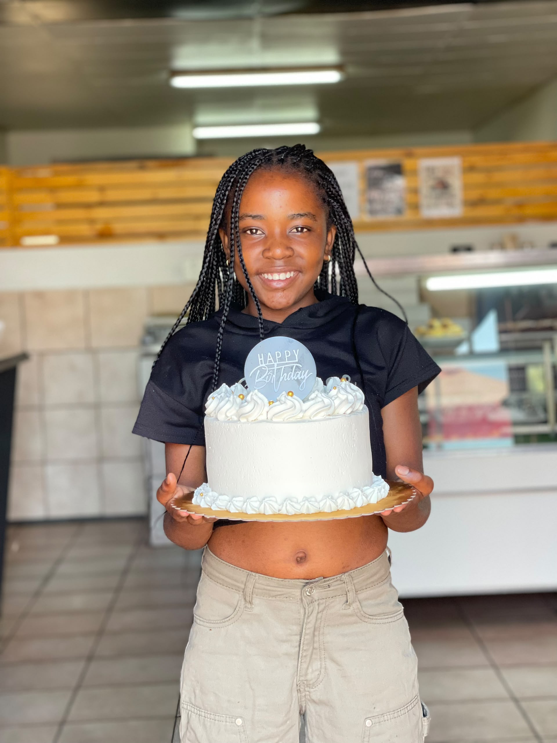 Ndapewa Iileka, happy Carens Bakery Corner CC customer